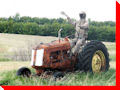 Waving Farmer on Tractor - Dinsmore, Saskatchewan