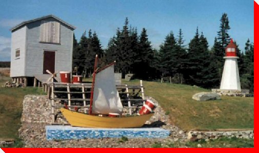 Boat and Lighthouse - Grand Bank, Newfoundland